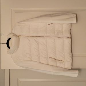 White puffer with asymmetrical zipper